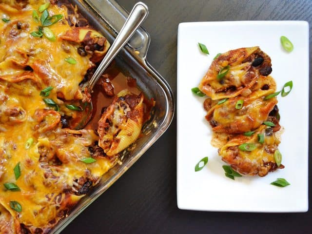 Taco shells displayed on a plate.