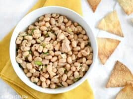 This Tuna and White Bean salad is mayo-free, but big on flavor. Whip up this salad in minutes to satisfy your hunger and tastebuds. BudgetBytes.com