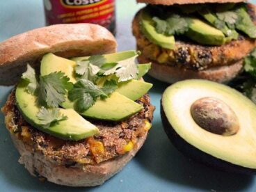 Chipotle burger topped with fresh veggies.