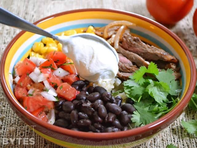 Adding a dollop of Sour Cream to top of bowl 