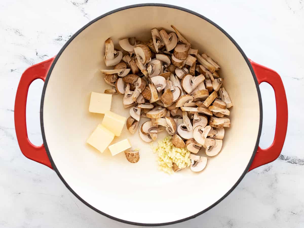 Butter, garlic, and mushrooms in the pot