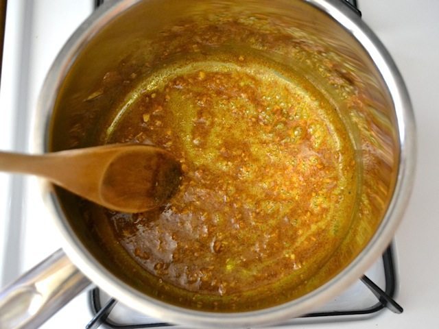 Cooking spice mixture in pot 