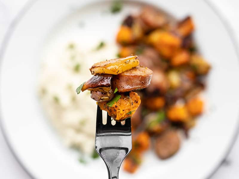 A forkful of Oven Roasted Autumn Medley held close to the camera