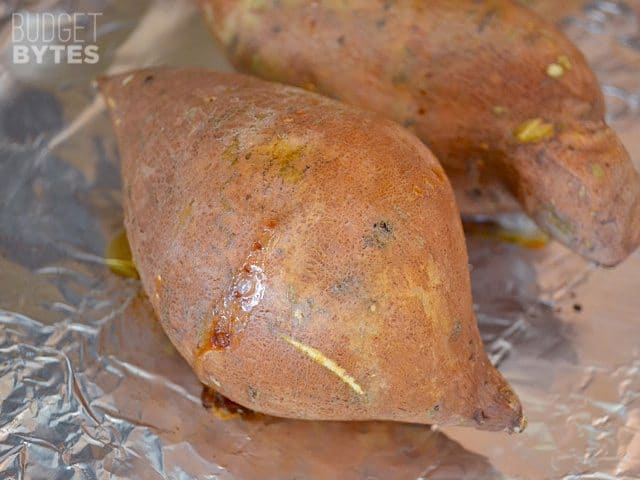 Baked Sweet Potatoes on baking sheet lined. with tin foil 