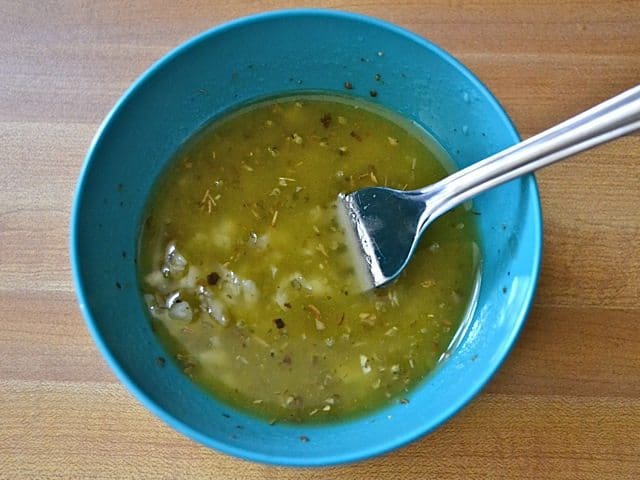 Marinade in small bowl with fork 