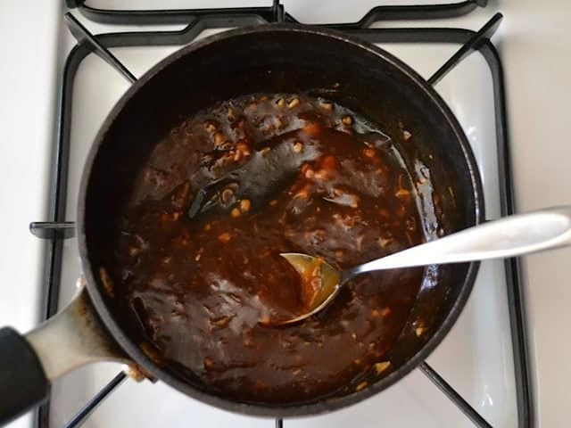 Remainder of marinade in pot on stove top to thicken Sauce