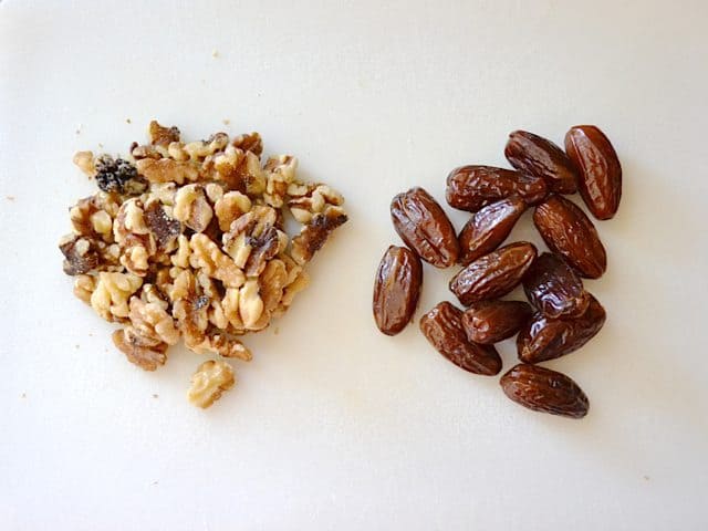 Walnuts and Dates on counter top 