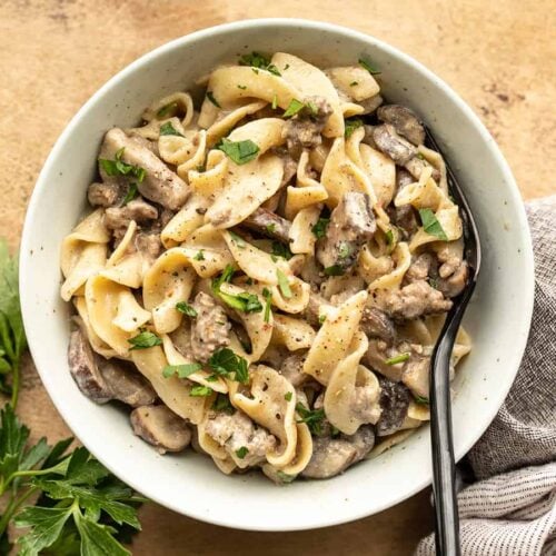 Overhead view of a bowl full of beef and mushroom stroganoff