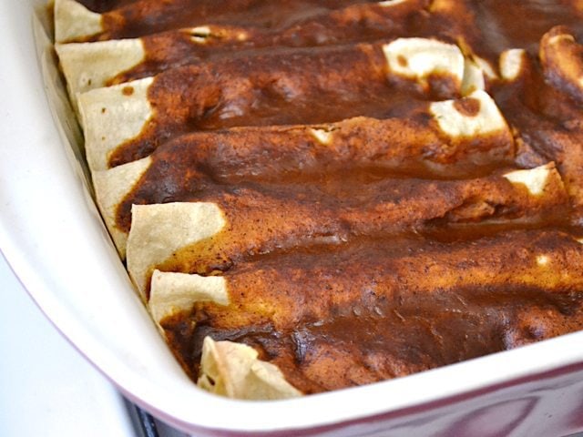 Baked Enchiladas in casserole dish 