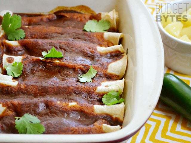 Top view of a dish of Beef & Pineapple Enchiladas