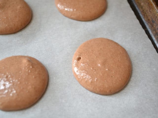 Piped batter on baking sheet 