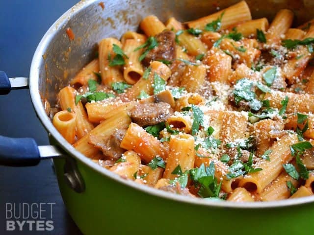 Parmesan cheese sprinkled on top of finished pasta 