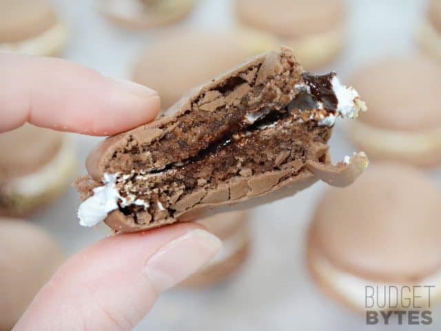 Close up of S'mores Macaron with bite taken out 