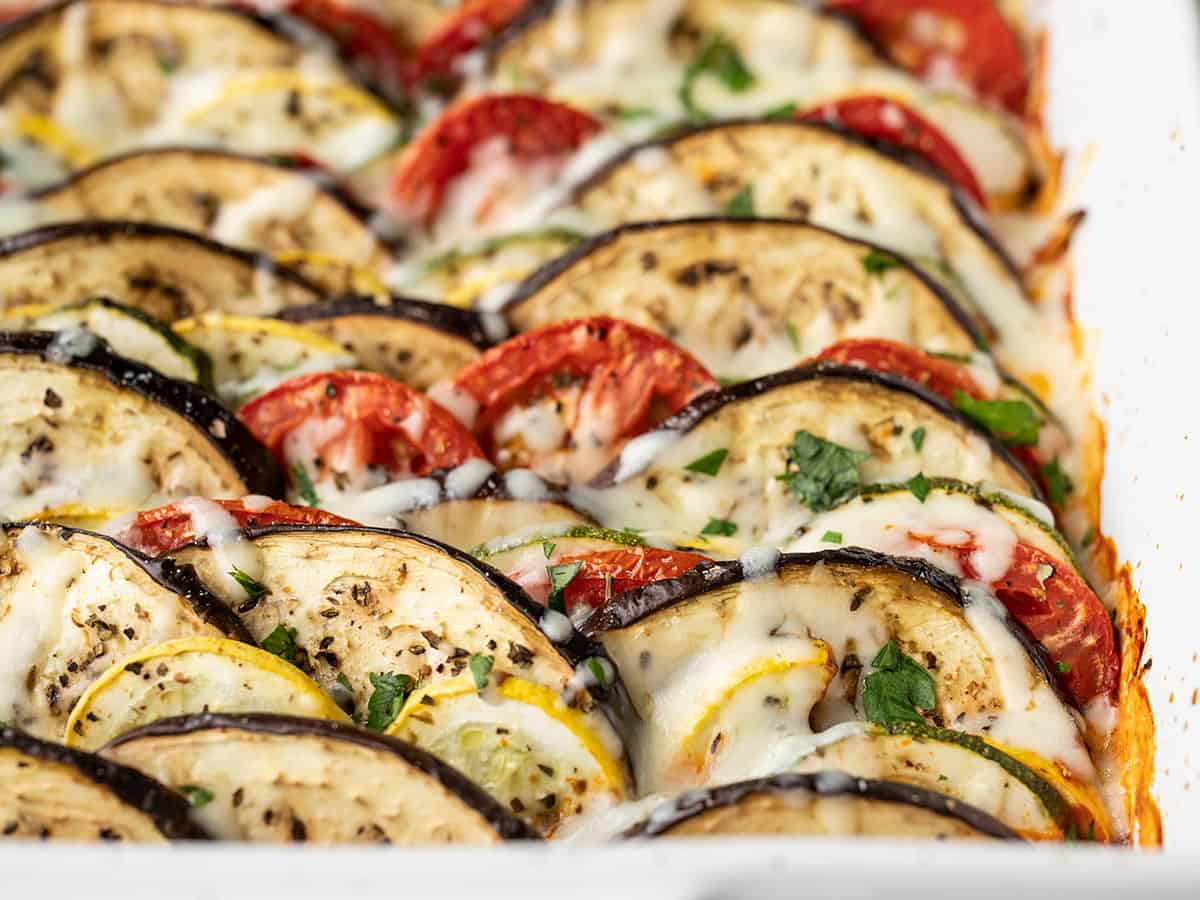 Close up side view of ratatouille in the casserole dish