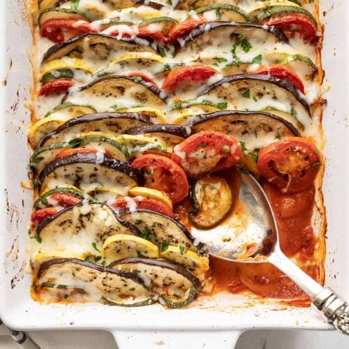 oven roasted ratatouille with a portion scooped out of the corner