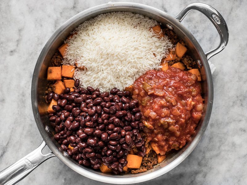 Beans, Rice and Salsa added to other ingredients in skillet 