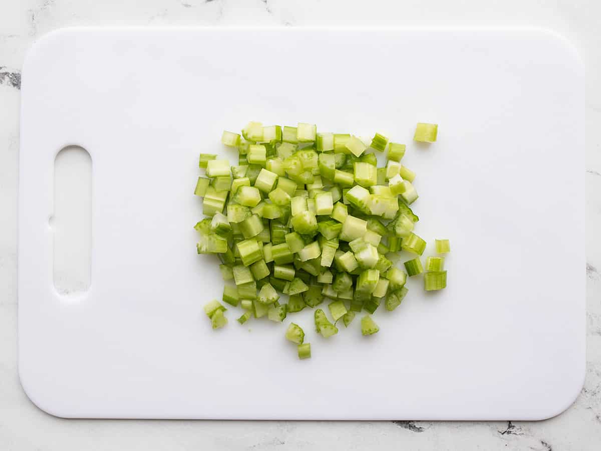 Chopped celery on a cutting board