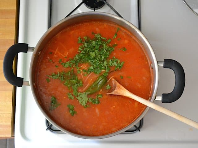 Final Seasoning added to pot on stove top 