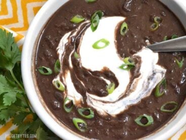 Packed with vegetables, flavor, protein, and fiber, this ultra-flavorful and low-calorie Slow Cooker Black Bean Soup is an all around winner! BudgetBytes.com