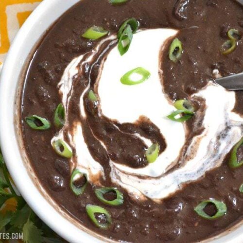 Packed with vegetables, flavor, protein, and fiber, this ultra-flavorful and low-calorie Slow Cooker Black Bean Soup is an all around winner! BudgetBytes.com