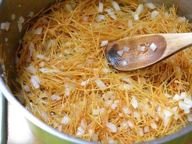 Soft Onions and browned pasta 