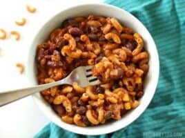 One Pot Chili Pasta is fast, easy, full of good-for-you beans and vegetables, and just enough cheese to feel like comfort food. BudgetBytes.com