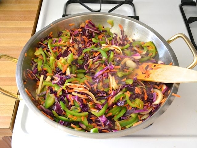 Stir Fry Vegetables in skillet cooking on stove top 