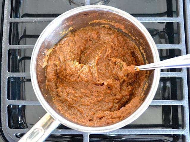 Cooked and mixed Pumpkin Spice Mixture in pot on stove top 