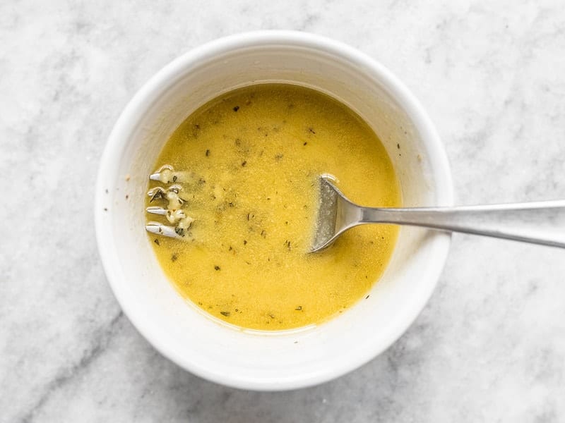 Homemade Dressing in small bowl with fork 