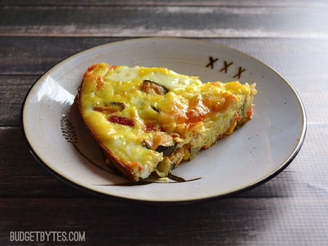 Plate with a slice of Zucchini and Corn Frittata