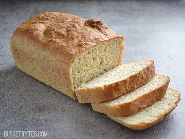 A front view of homemade English muffin bread on a table.