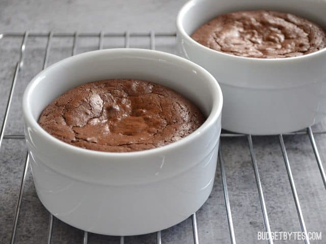 Fudge brownie pots for two displayed in ramekins.