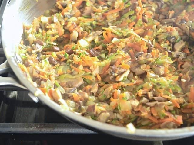 Cooking veggie mixture in skillet 