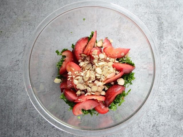 Parsley Plums and Almonds in a glass mixing bowl