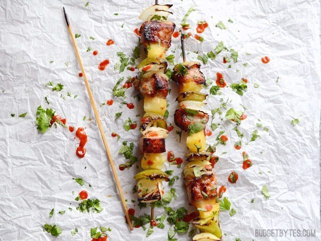 Pineapple pork kebabs served on a plate.