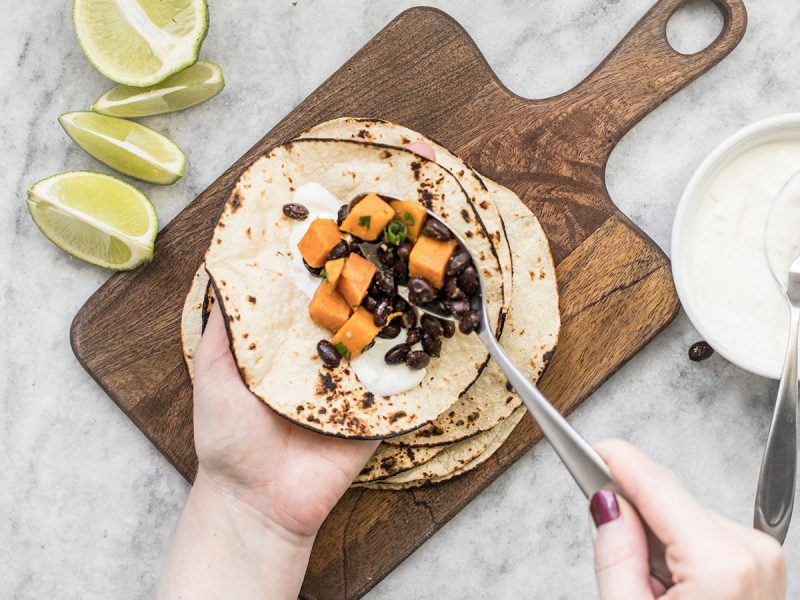 Add sweet potato and black bean mixture to taco