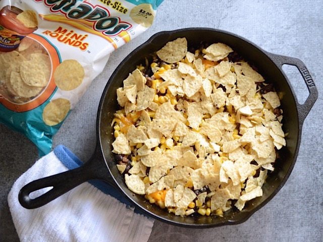 Crushed Tortilla Chips added to the skillet