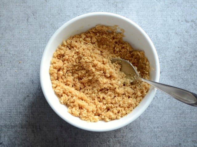 Crushed graham crackers, sugar, and melted butter mixed