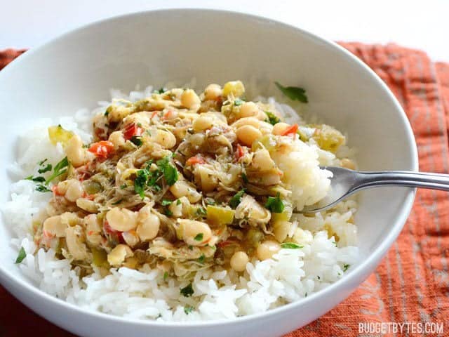 Side view of a bowl of Creole White Beans with Chicken 