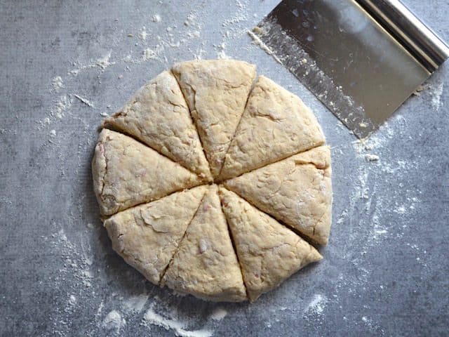 Scones shaped into a circle and cut into wedges.