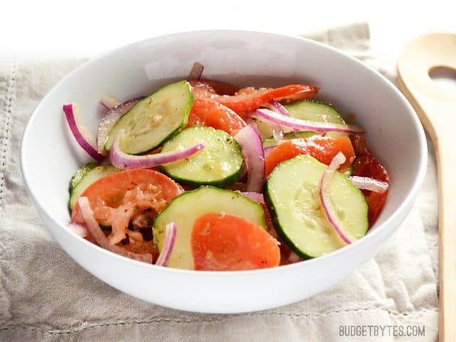 Front view of a bowl of Simple Cucumber Tomato Salad