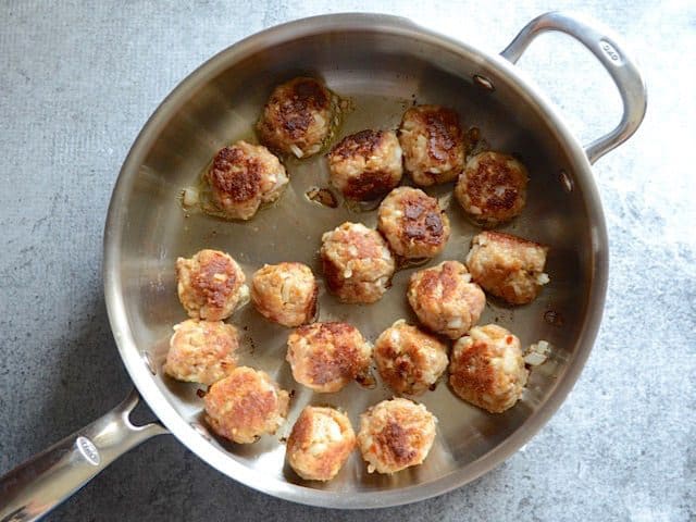 Browned meatballs in the skillet