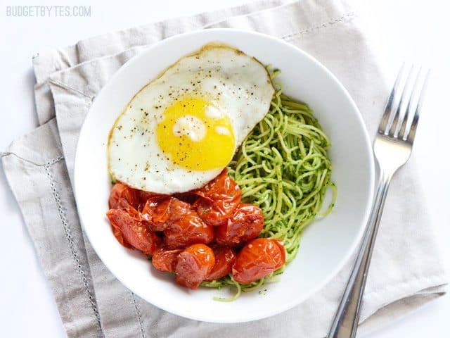 Pasta with parsley pesto and blistered tomatoes.