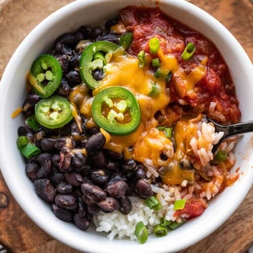 Close up overhead shot of a poor man's burrito bowl with melted cheese