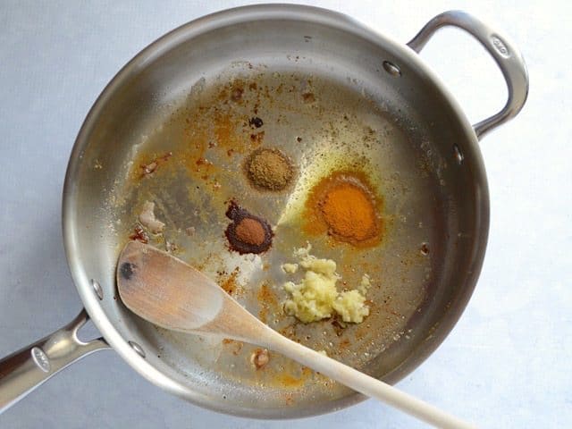 garlic and spices added to the skillet