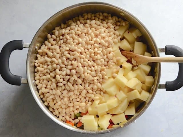 Add Potatoes and Soaked Beans to the soup pot