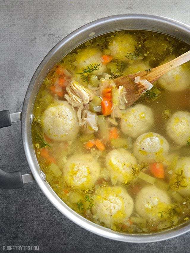 Close up of Matzo Ball Soup in pot 