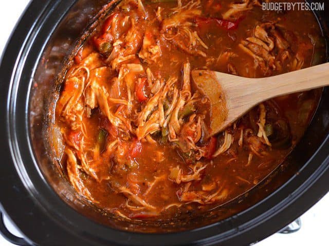 A dish of slow-cooker Italian chicken and peppers.