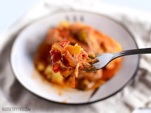 Close up of a forkful of Slow Cooker Italian Chicken and Peppers 