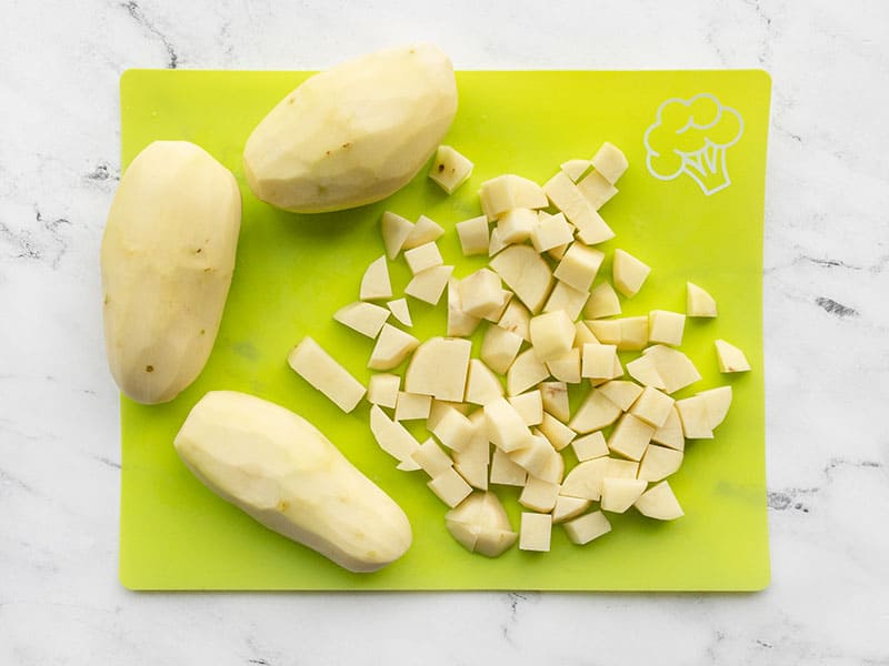 Diced potatoes on a cutting board